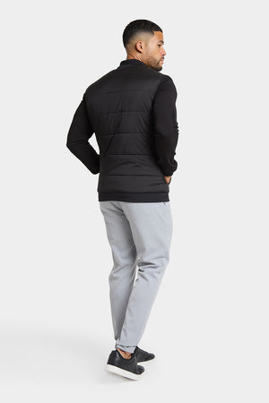 Quilted Hybrid Jacket in Black - TAILORED ATHLETE - ROW