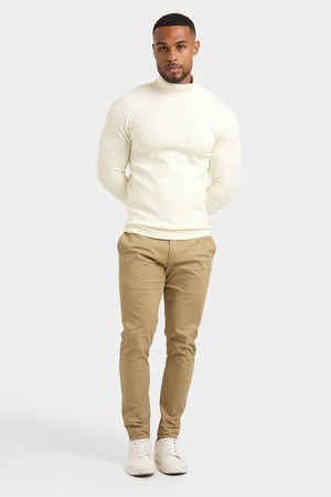 Supersoft Roll Neck in Chalk - TAILORED ATHLETE - ROW