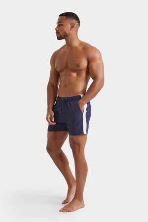 Side Stripe Swim Shorts in Navy - TAILORED ATHLETE - ROW