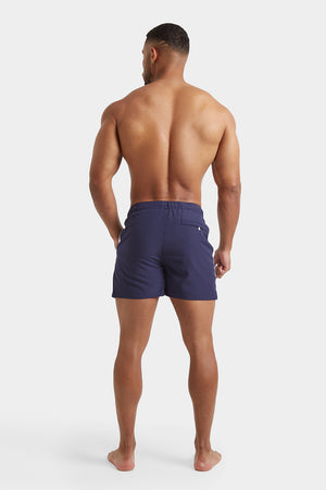 Side Stripe Swim Shorts in Navy - TAILORED ATHLETE - ROW