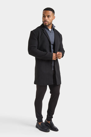 Single Breasted Overcoat in Black - TAILORED ATHLETE - ROW