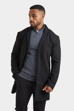 Single Breasted Overcoat in Black - TAILORED ATHLETE - ROW