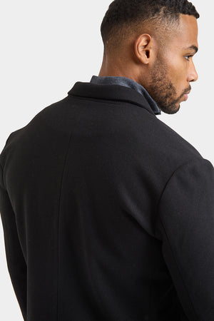 Single Breasted Overcoat in Black - TAILORED ATHLETE - ROW