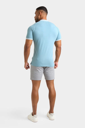 Stripe Tipped Zip Neck Polo Shirt in Aqua - TAILORED ATHLETE - ROW