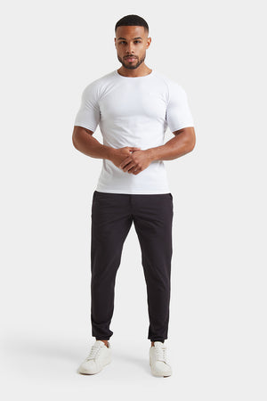 Everyday Tech Trousers in Black - TAILORED ATHLETE - ROW