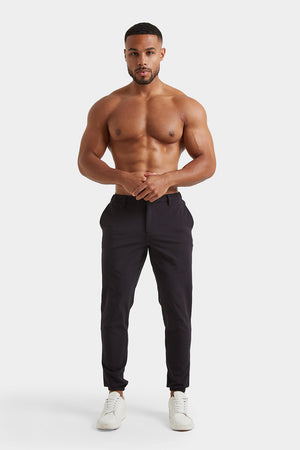 Everyday Tech Trousers in Black - TAILORED ATHLETE - ROW