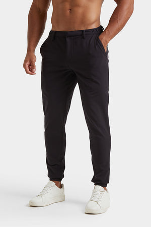 Everyday Tech Trousers in Black - TAILORED ATHLETE - ROW