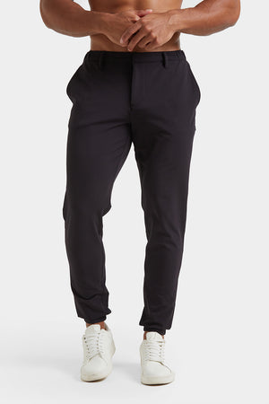 Everyday Tech Trousers in Black - TAILORED ATHLETE - ROW