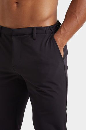 Everyday Tech Trousers in Black - TAILORED ATHLETE - ROW