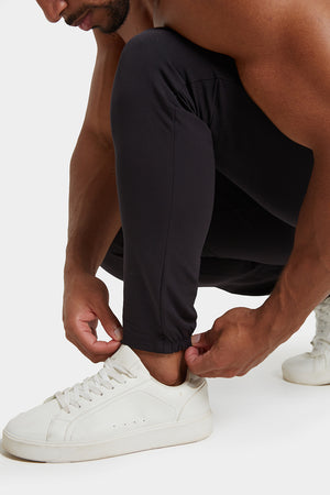 Everyday Tech Trousers in Black - TAILORED ATHLETE - ROW