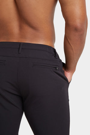 Everyday Tech Trousers in Black - TAILORED ATHLETE - ROW