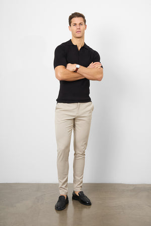 Textured Open Collar Knitted Polo Shirt in Black - TAILORED ATHLETE - ROW