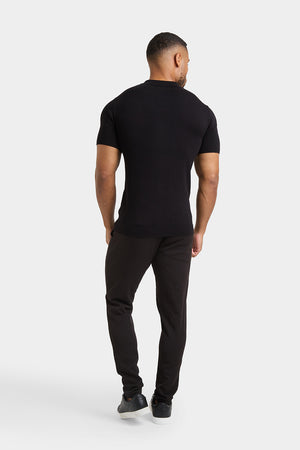 Zipped Knitted Shirt in Black - TAILORED ATHLETE - ROW