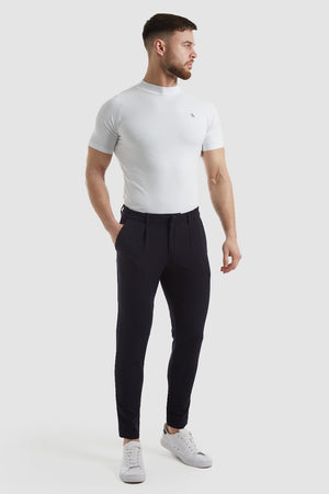 Cropped Pleated Trouser in Navy - TAILORED ATHLETE - ROW